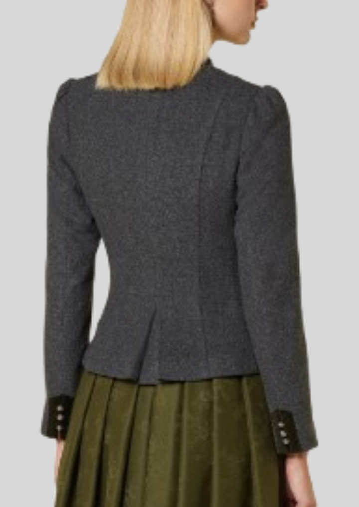 Classic women’s wool coat blending heritage style with elegance.