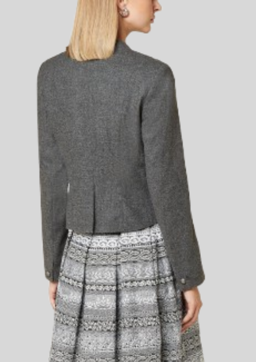 Timeless women’s wool coat blending Bavarian heritage with modern style.