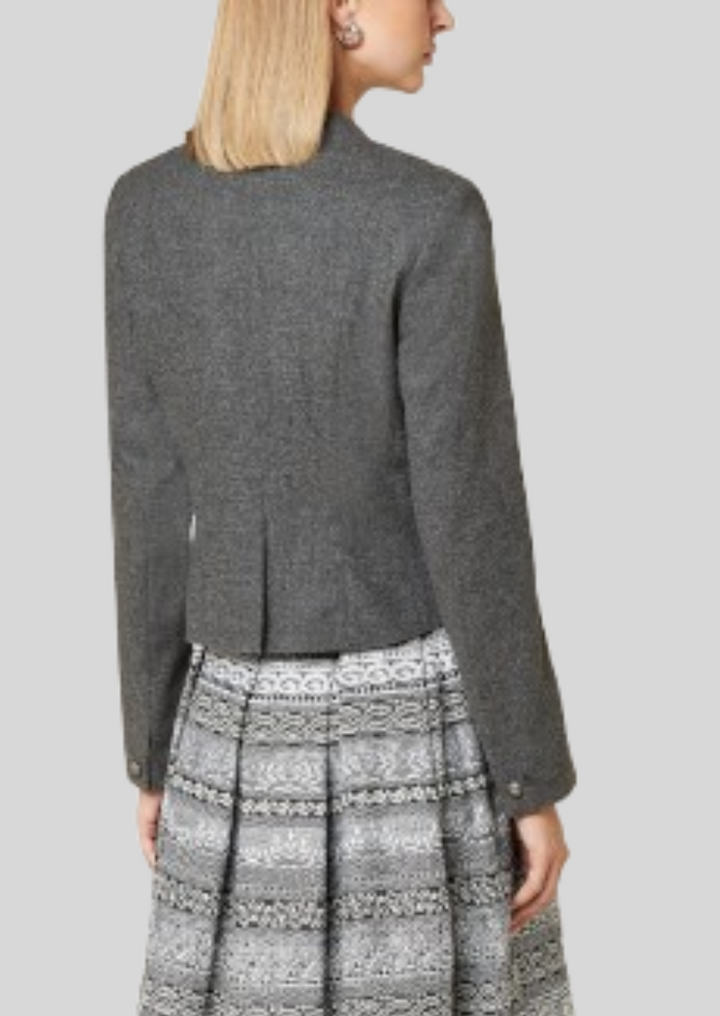 Timeless women’s wool coat blending Bavarian heritage with modern style.