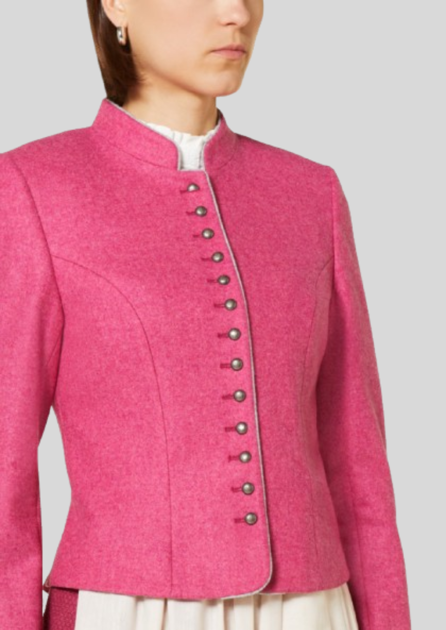 Timeless women’s pink wool coat blending Bavarian heritage with modern style.