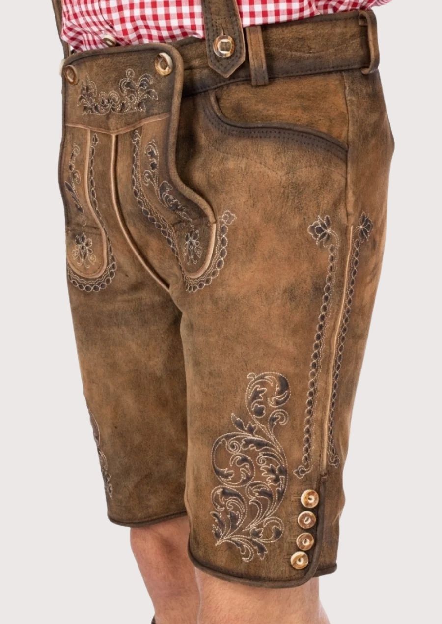 Authentic Bavarian Lederhosen for men, crafted from premium leather with detailed embroidery, perfect for Oktoberfest and cultural events.