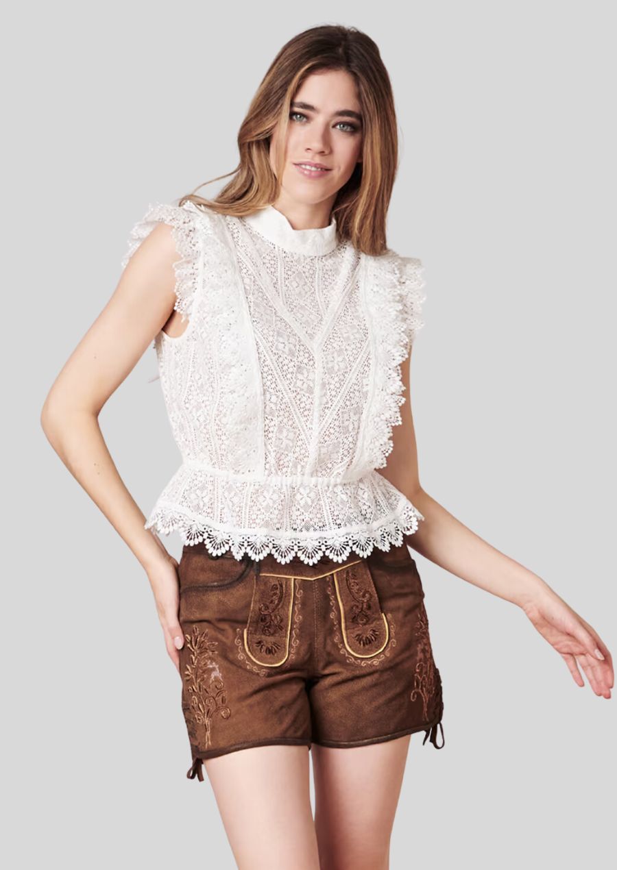 Indulge in unparalleled luxury with our Genuine Goat Skin Women's Lederhosen. Crafted from the finest quality goat skin, these luxurious trousers offer a butter-soft feel and a naturally beautiful drape. 