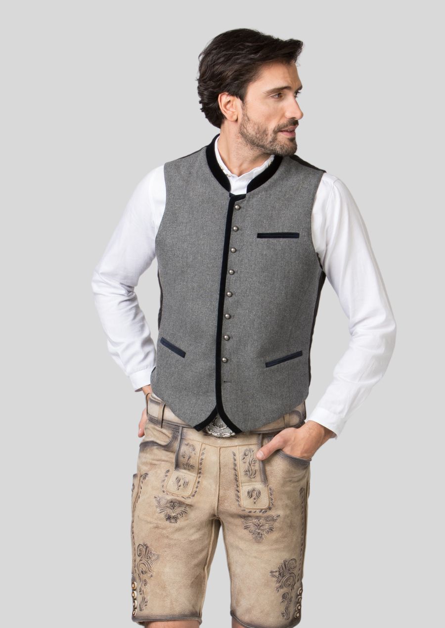 Channel Bavarian charm and elevate your Oktoberfest outfit with our Authentic Trachten Vests. Crafted with meticulous attention to detail and featuring