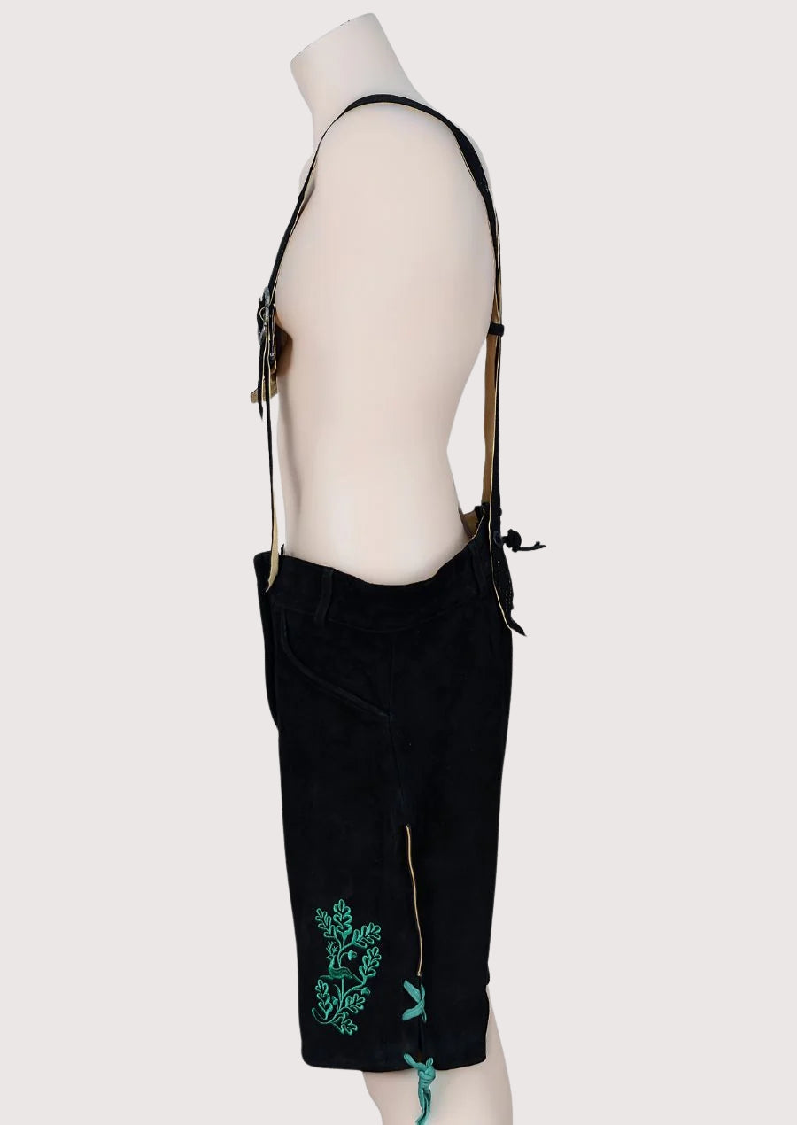 Alpine black lederhosen leather shorts with classic suspenders and embroidery