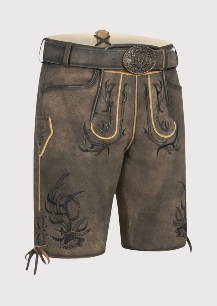 Authentic alpine leather lederhosen in rustic brown showing classic Bavarian short design