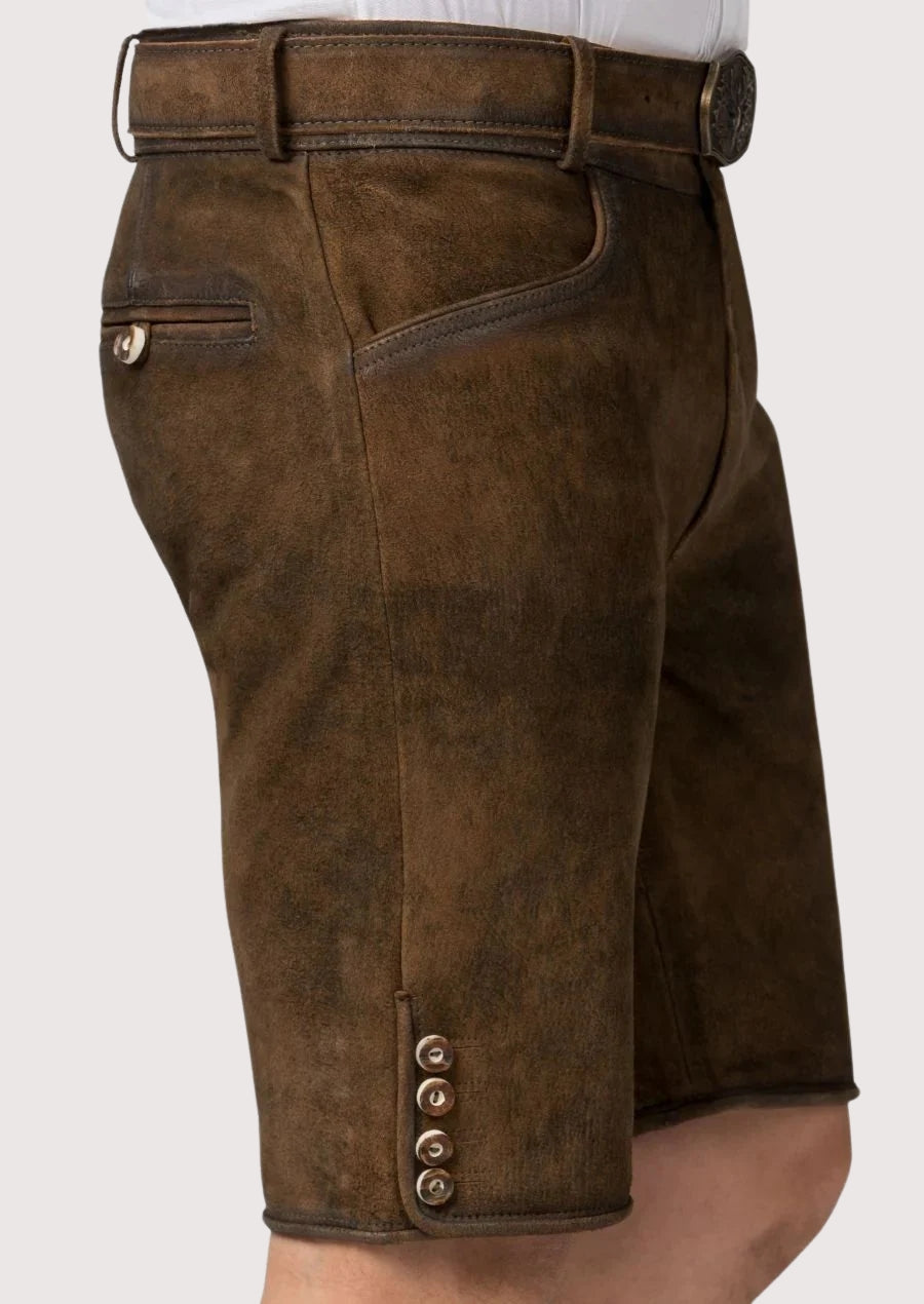 Authentic brown Bavarian lederhosen leather shorts, heritage alpine Oktoberfest clothing.
