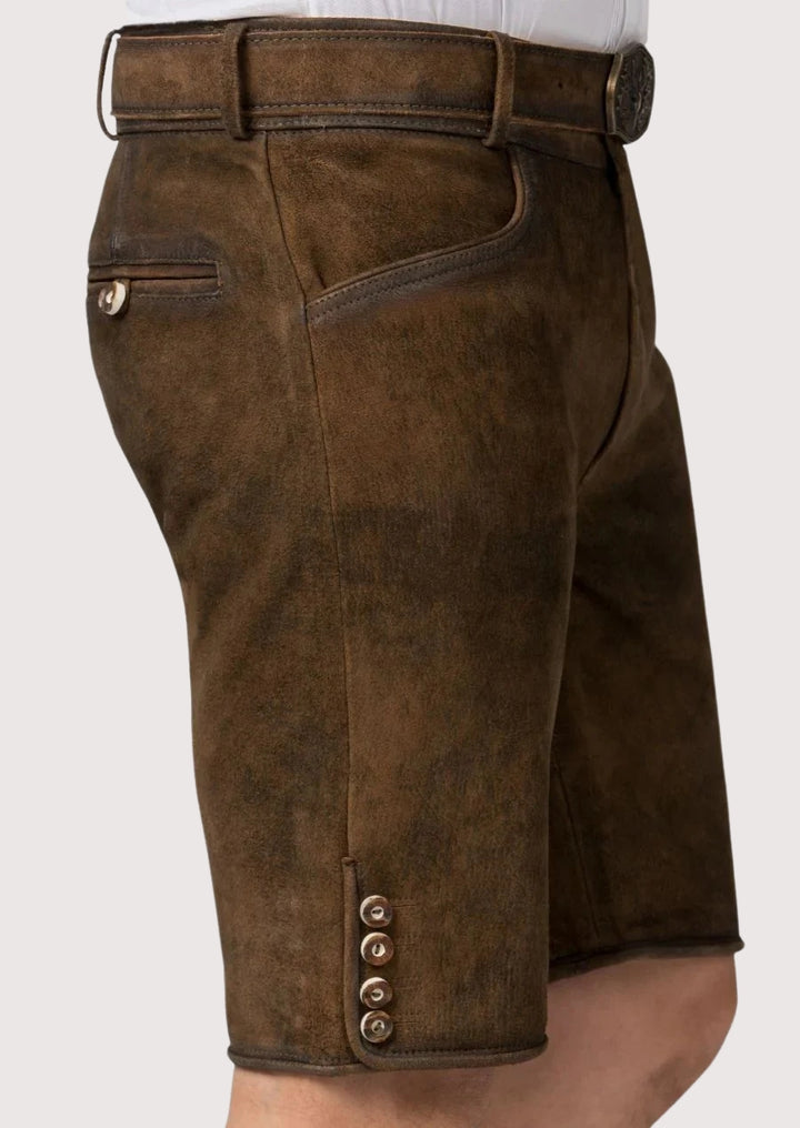 Authentic brown Bavarian lederhosen leather shorts, heritage alpine Oktoberfest clothing.