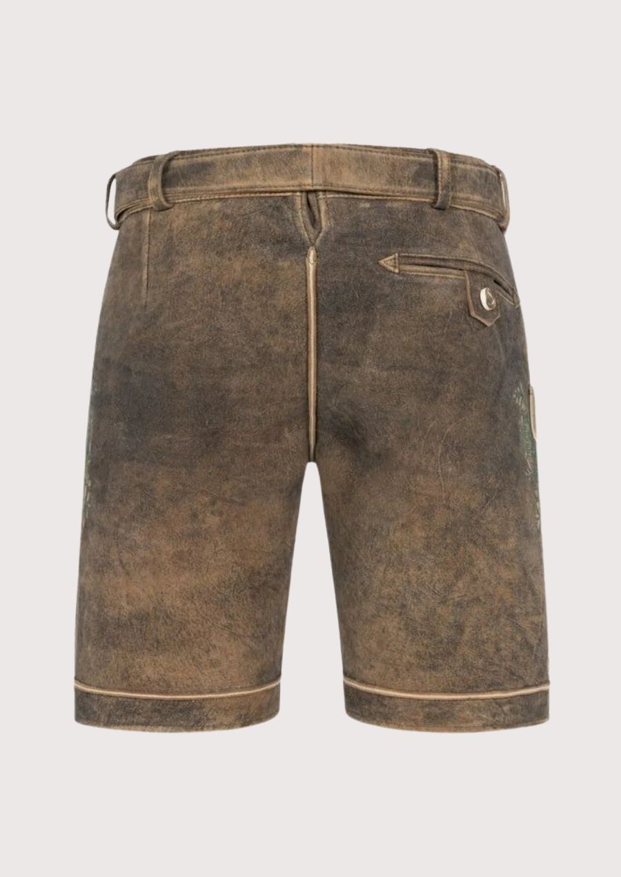 High-quality leather lederhosen for men with embossed belt buckle and authentic embroidery – essential Oktoberfest attire.