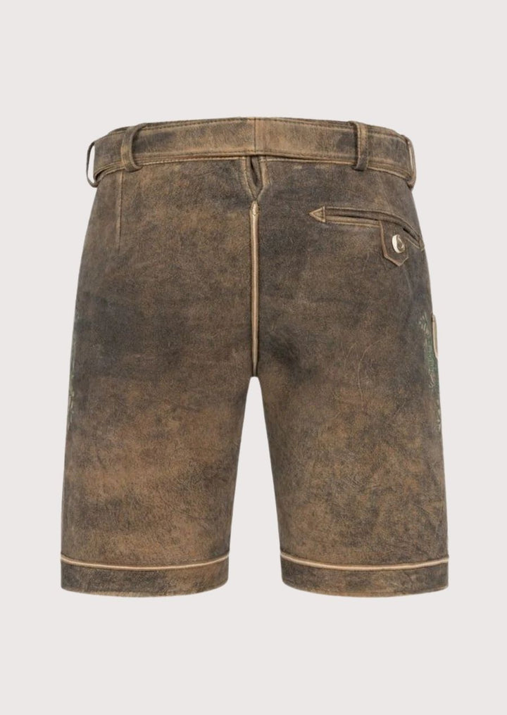 High-quality leather lederhosen for men with embossed belt buckle and authentic embroidery – essential Oktoberfest attire.