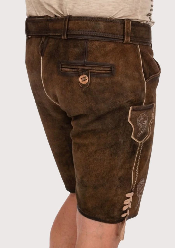 Rustic brown German leather shorts featuring modern fit and stag belt buckle