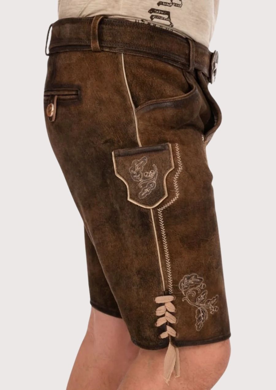 Traditional Bavarian men's costume with embroidery and adjustable side ties