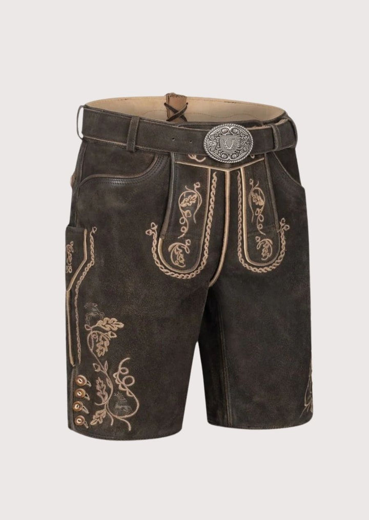 Classic German lederhosen for men featuring authentic floral embroidery and antique-style belt – perfect Oktoberfest festival wear.