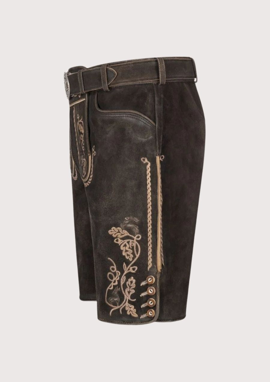 Authentic dark brown suede lederhosen for men with oak leaf embroidery – handcrafted Oktoberfest attire with adjustable belt.
