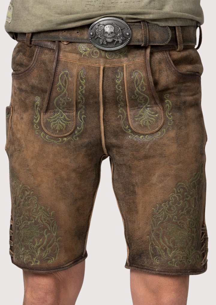 Brown lederhosen shorts featuring green embroidery and traditional Bavarian leather belt buckle