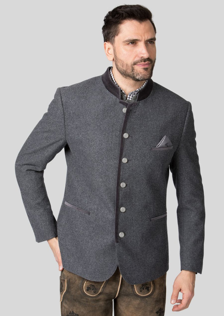 Invest in a coat crafted from premium materials like wool or loden. These fabrics not only drape beautifully but also offer breathability and comfort throughout the festivities.