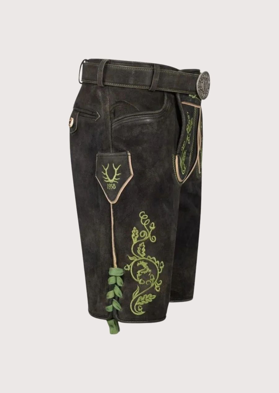 Authentic Bavarian lederhosen for men with custom fit and green embroidered design for Oktoberfest.