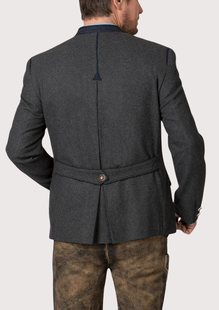 Elegant dark grey Bavarian Trachten blazer styled with traditional leather trousers for festive occasions