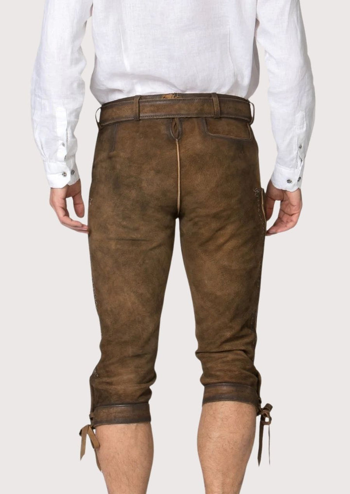 Comfortable and stylish men's Bundhosen made from high-quality leather, perfect for outdoor winter events and cultural festivals.