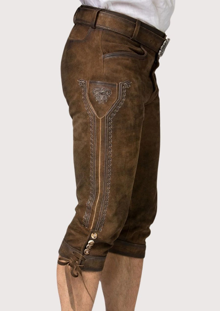 Traditional winter Bundhosen for men, crafted from durable leather with intricate hand-stitched details and adjustable fit.