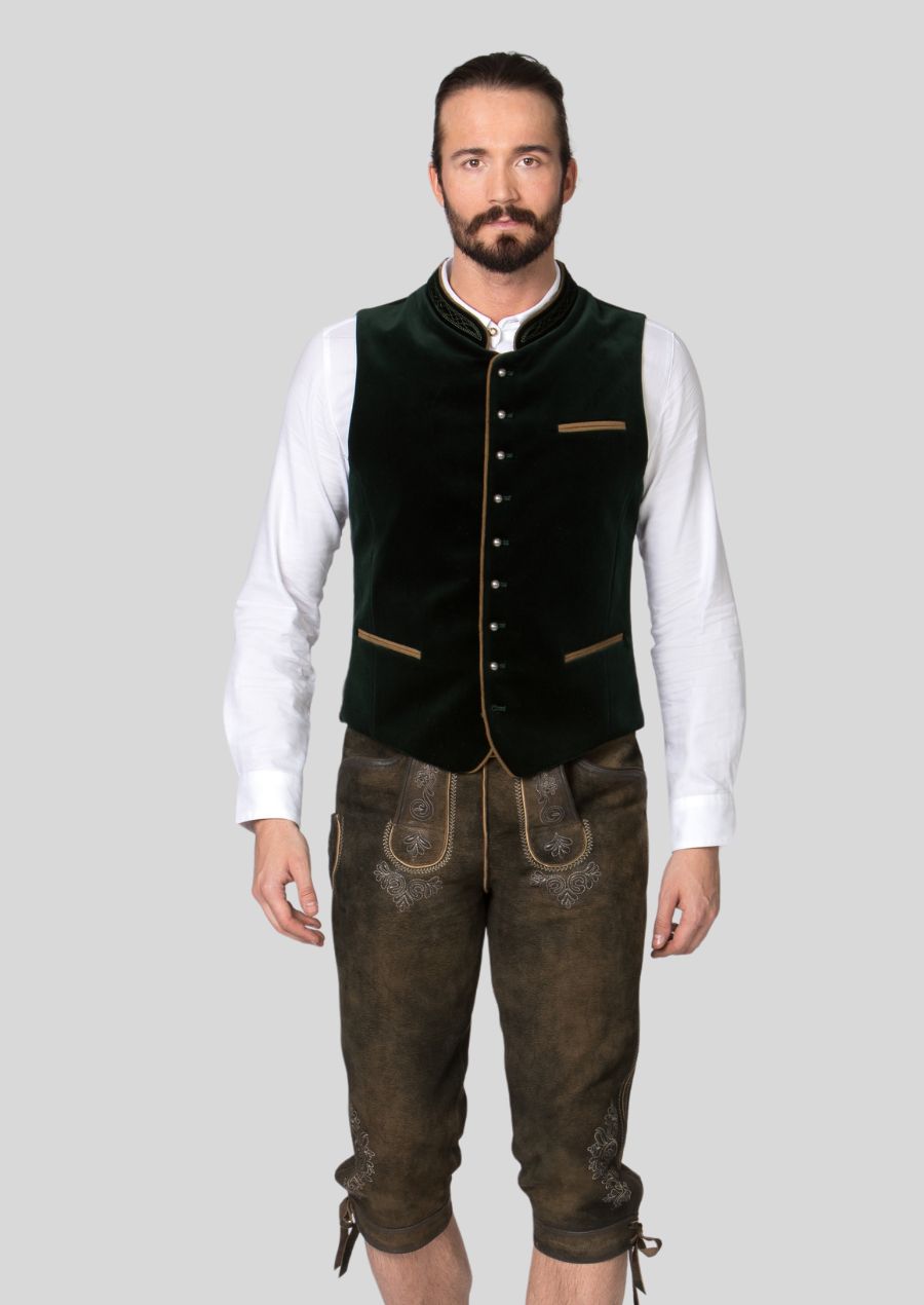 Experience the enduring heritage of Bavaria with a men's Trachten vest.  Crafted with high-quality materials (mention specific materials, e.g., wool, loden), this vest features  **(mention classic design elements, e.g., traditional cuts, decorative buttons)  **that have stood the test of time.  Modern details (mention specific features, e.g., breathable fabrics, relaxed fit)  ensure exceptional comfort, allowing you to celebrate in style and enjoy the festivities to the fullest.