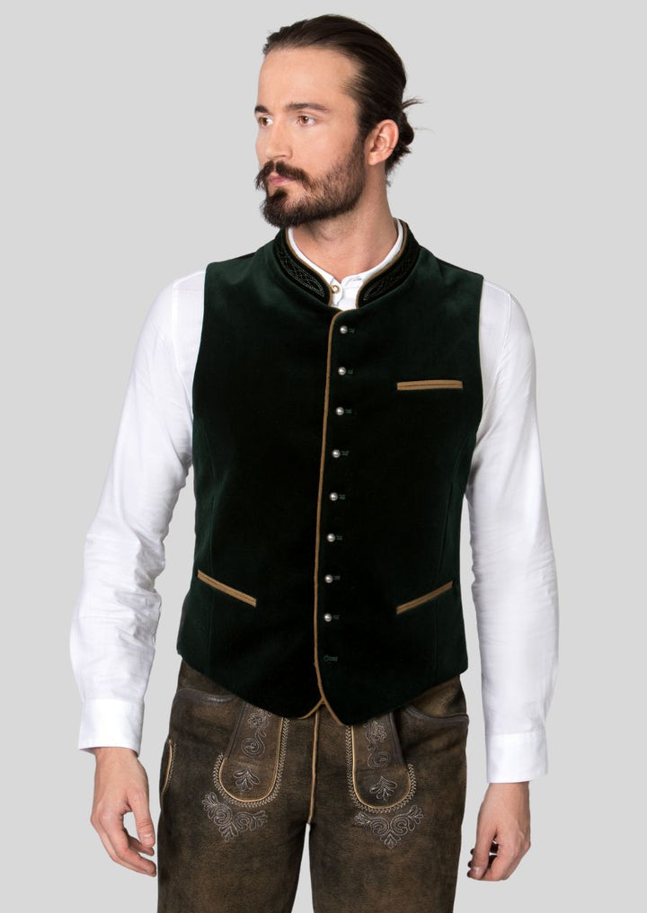 Step into timeless Bavarian style with the comfort you crave.  The men's Trachten vest is crafted with  **(mention materials known for comfort, e.g., soft wools, breathable linens)  **to provide exceptional comfort throughout the day.  Functional features (mention specific features, e.g., practical pockets, adjustable straps)  ensure you have everything you need close at hand.  Celebrate in style and experience the effortless comfort of a Trachten vest.