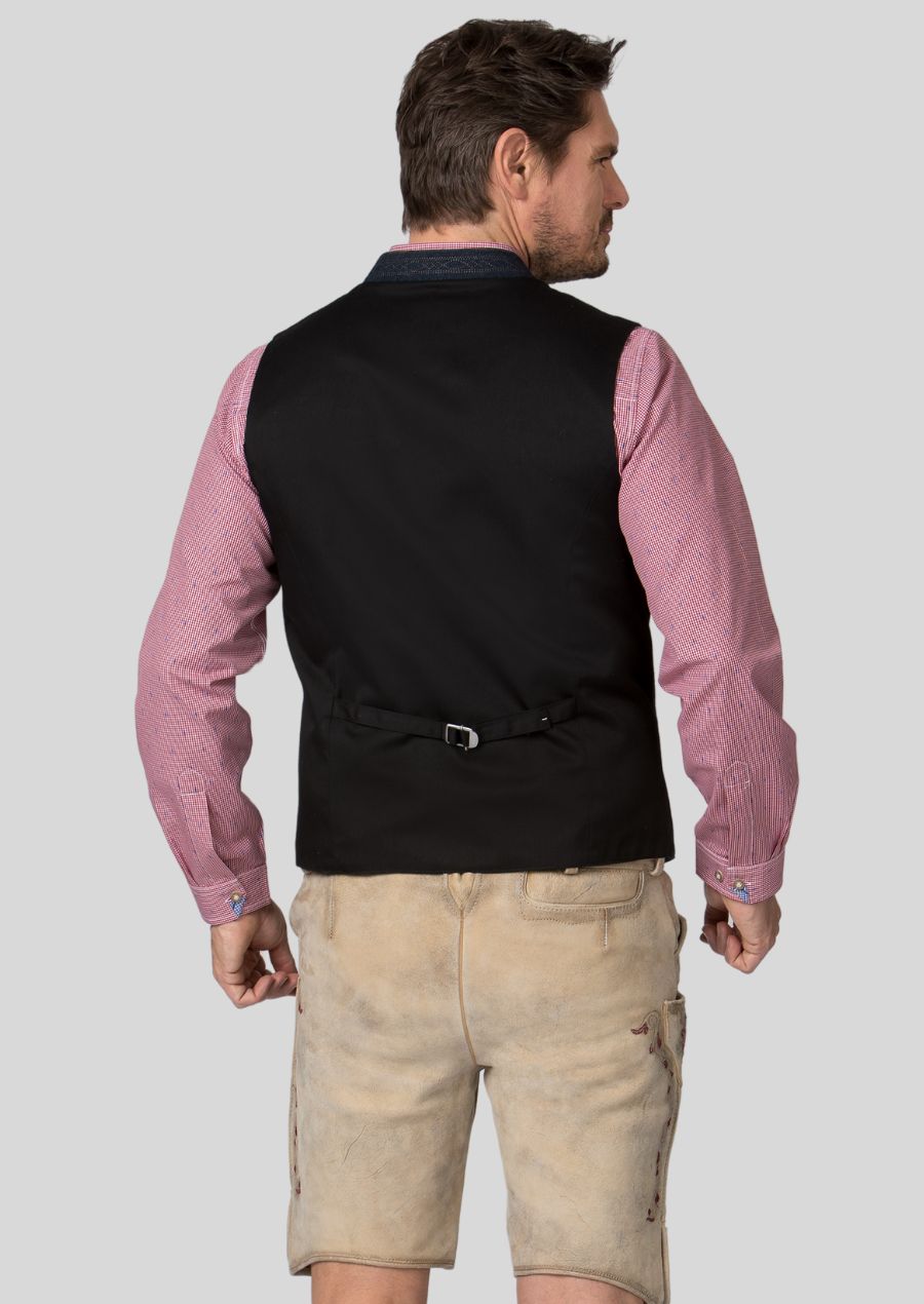 The Trachten vest isn't just about looks; it's about feeling your best.  Made with comfortable, breathable materials, this vest allows you to move freely and celebrate in style.  The timeless design and traditional touches will ensure you look confident and embrace the spirit of Bavaria at any event.