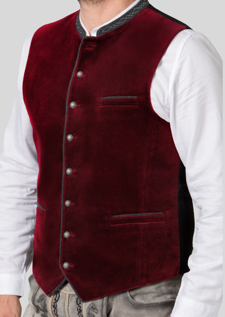 The Trachten vest is your gateway to Bavarian style!  This versatile piece adds a touch of cultural flair to any occasion.  Dress it up for a formal event by pairing it with a traditional shirt and lederhosen.  For a more casual look, pair it with jeans and a t-shirt.  No matter how you style it, a Trachten vest is sure to turn heads and spark conversations about your unique sense of style.