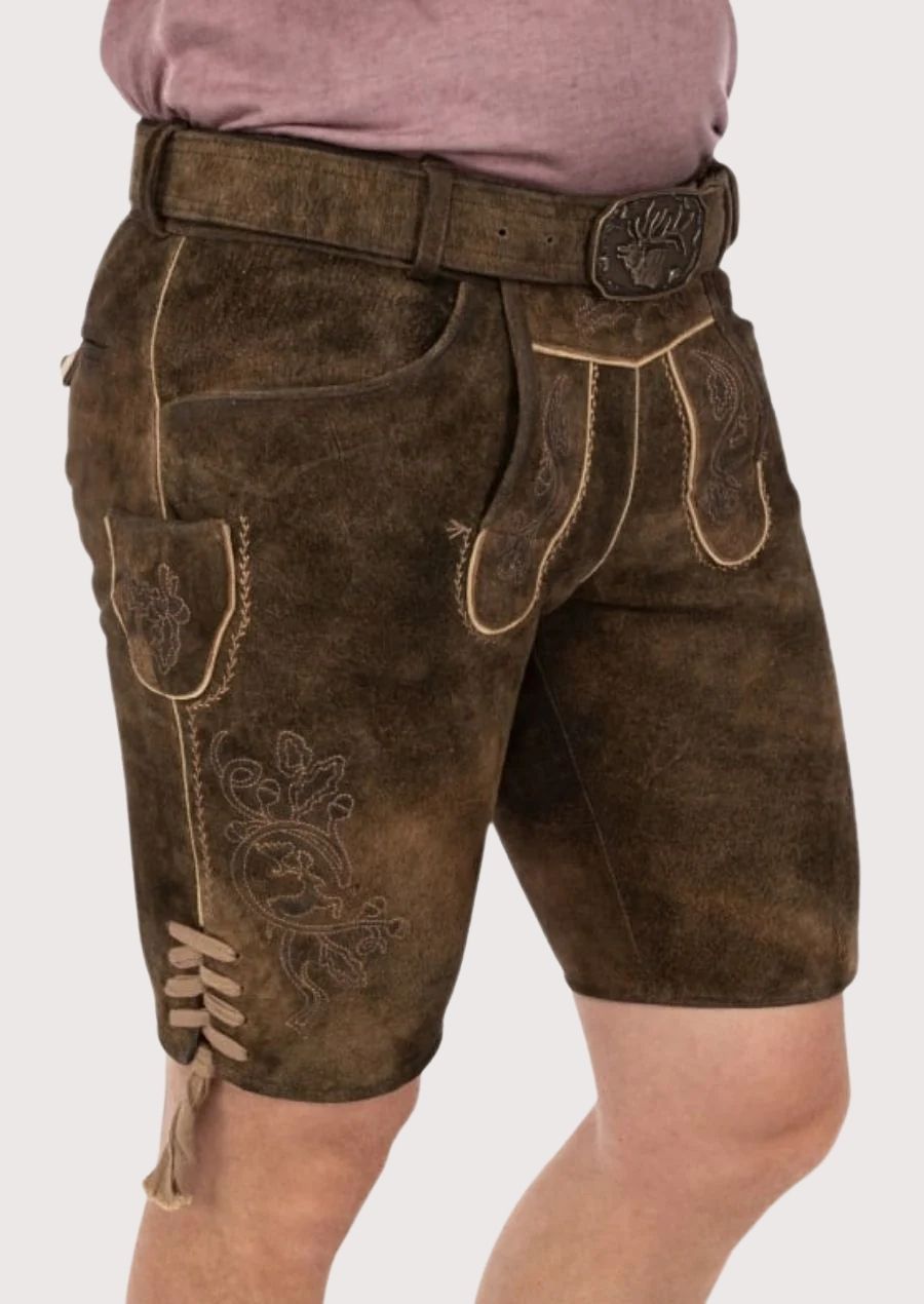 Comfortable men’s Lederhosen featuring adjustable fit and rustic brown leather, ideal for Bavarian events and weddings.