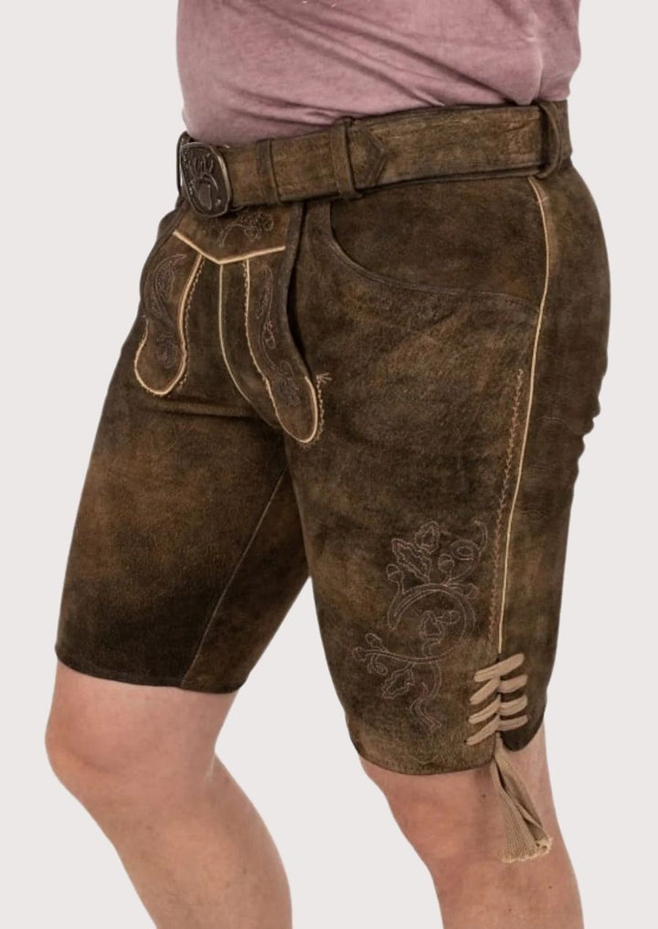 Authentic Bavarian Lederhosen for men with intricate embroidery, perfect for cultural festivals and Oktoberfest 2025.