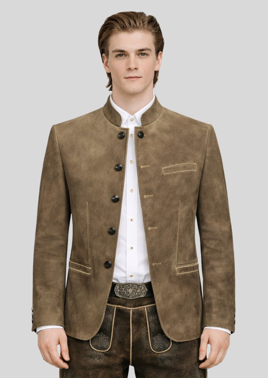 Man wearing a luxury Bavarian trachten jacket with white band-collar shirt and traditional lederhosen.