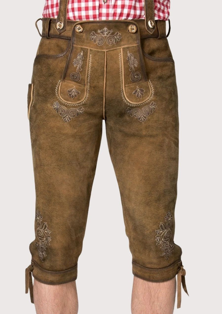 Durable and stylish men's Bundhosen, crafted from luxury leather with adjustable fit and classic embroidery, perfect for winter events.