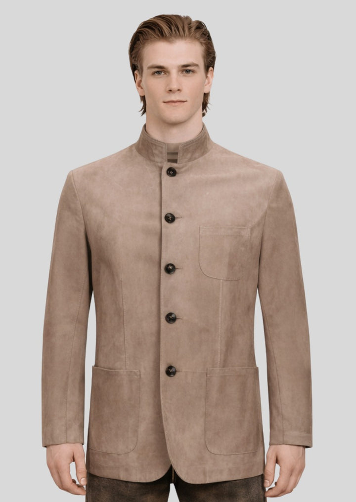 Male model wearing a beige Bavarian trachten jacket with stand collar, suede texture, and classic tailoring.