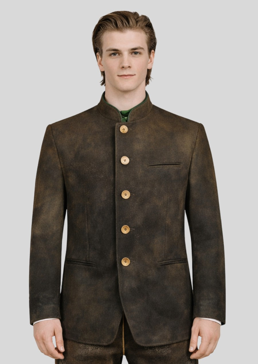 Male model wearing a brown Bavarian trachten jacket with high collar, wooden buttons, and classic alpine tailoring.