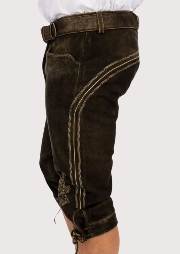 Traditional hand-stitched embroidery on men's Bundhosen pants for a timeless look