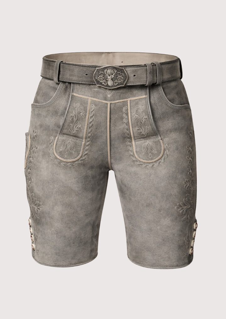 Traditional German lederhosen with decorative stitching on a plain background