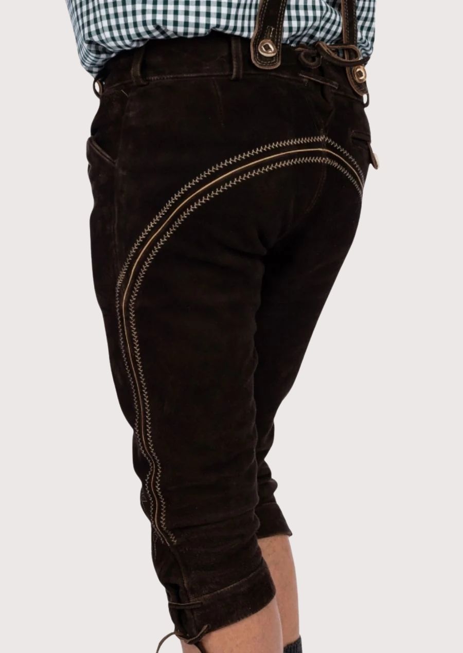 Premium leather Bundhosen for men, featuring intricate embroidery and adjustable fit, ideal for staying warm and stylish during winter events.