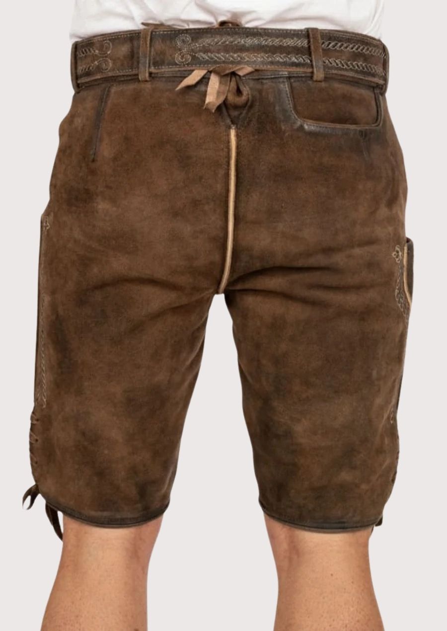 Handcrafted German lederhosen with intricate embroidery and adjustable belt