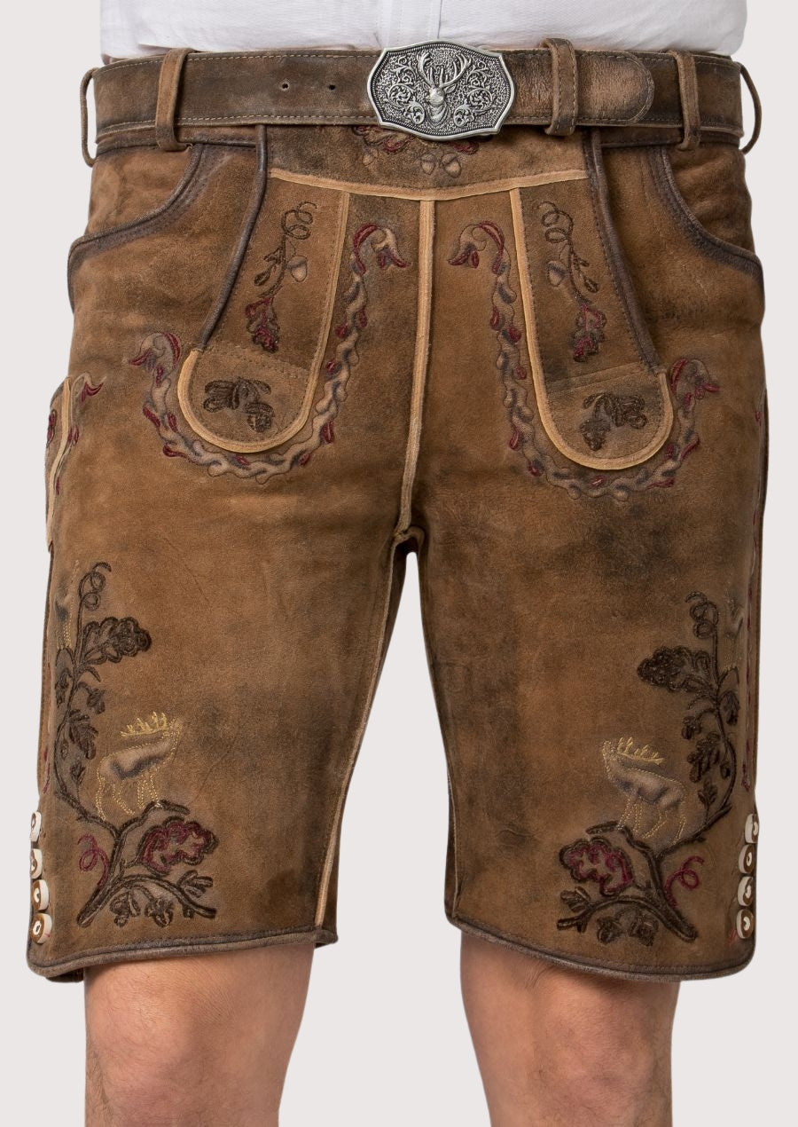Men’s brown leather lederhosen featuring traditional embroidery