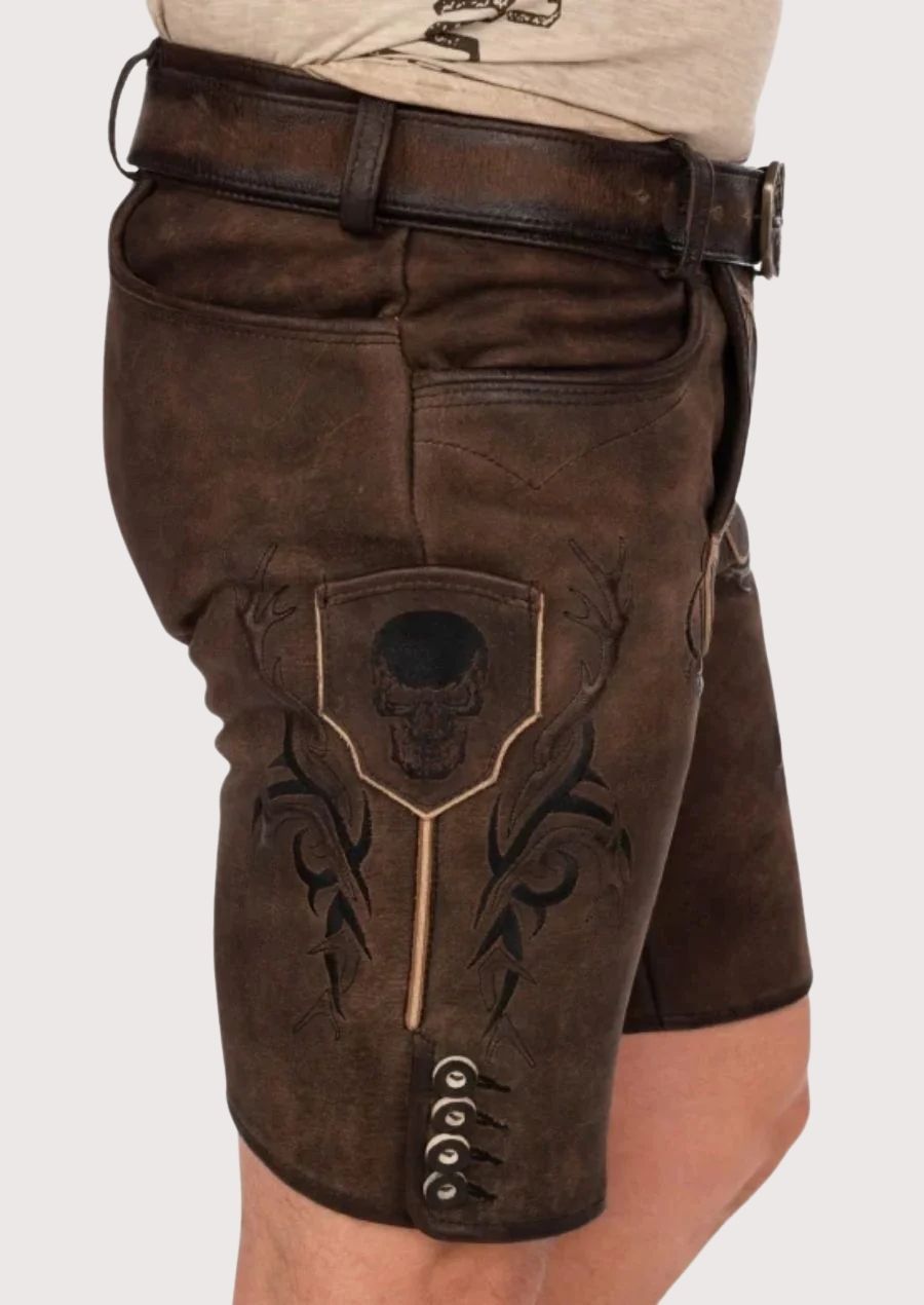 Stylish men's lederhosen in dark brown leather with skull and floral embroidery