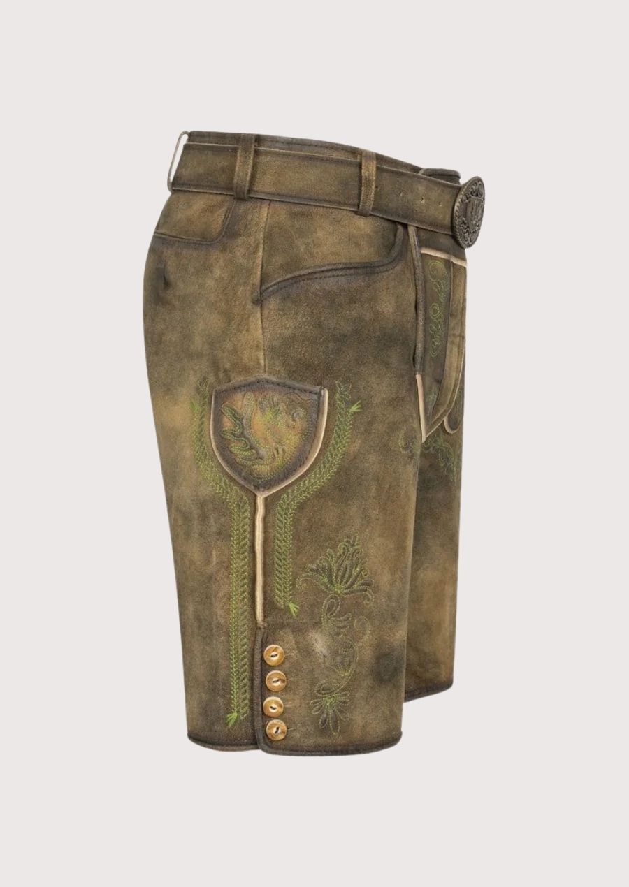 Bavarian men’s lederhosen with classic belt and floral accents – must-have Oktoberfest outfit made from premium quality leather.