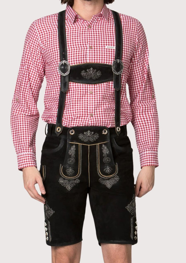 Authentic Bavarian men's Lederhosen made from high-quality leather, featuring silver embroidery for Oktoberfest celebrations.