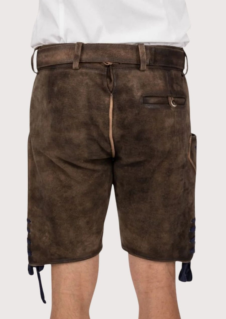 Men’s Lederhosen with luxurious leather and elegant blue floral embroidery, ideal for cultural celebrations.