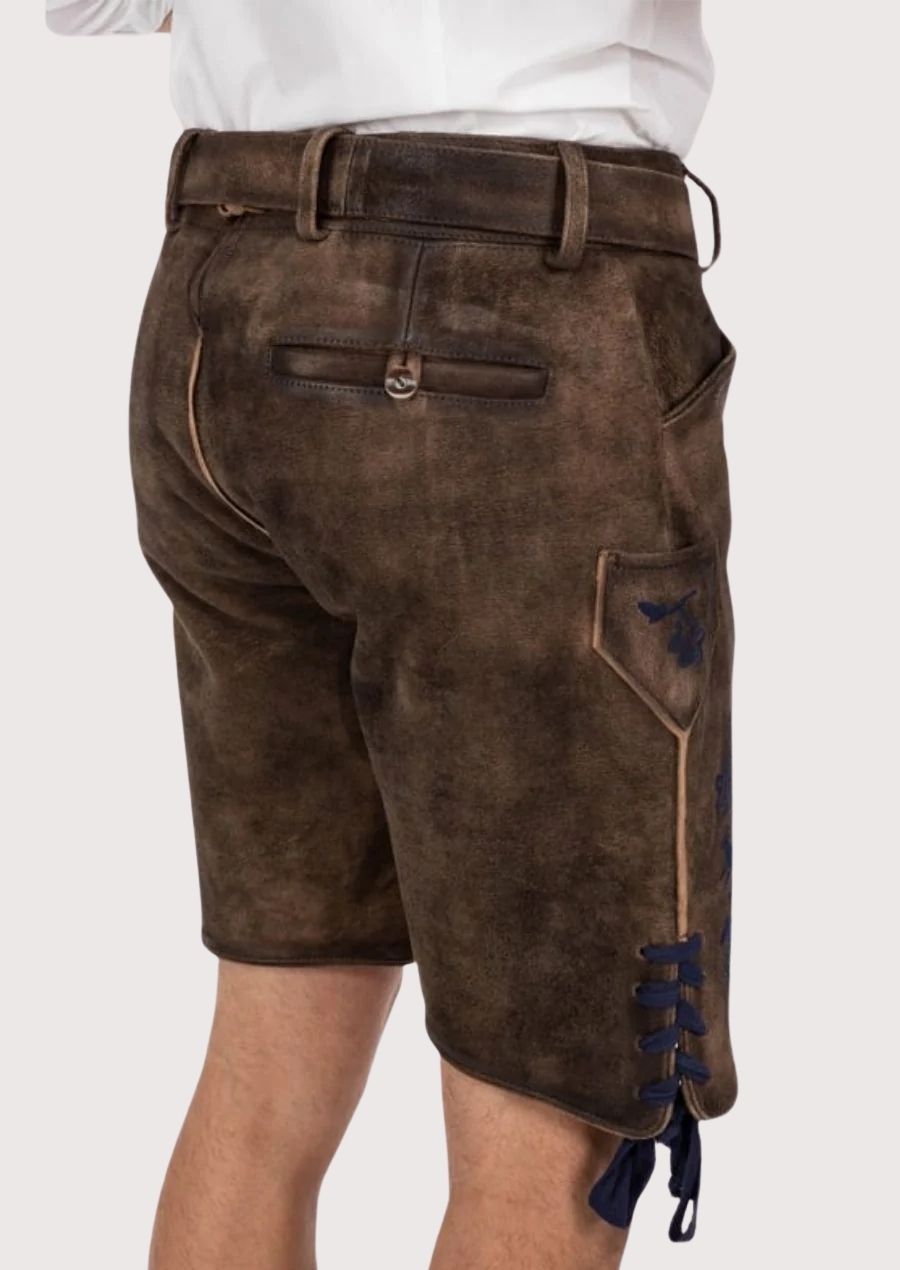 Stylish men's Lederhosen with premium leather construction and traditional blue floral design for Oktoberfest.