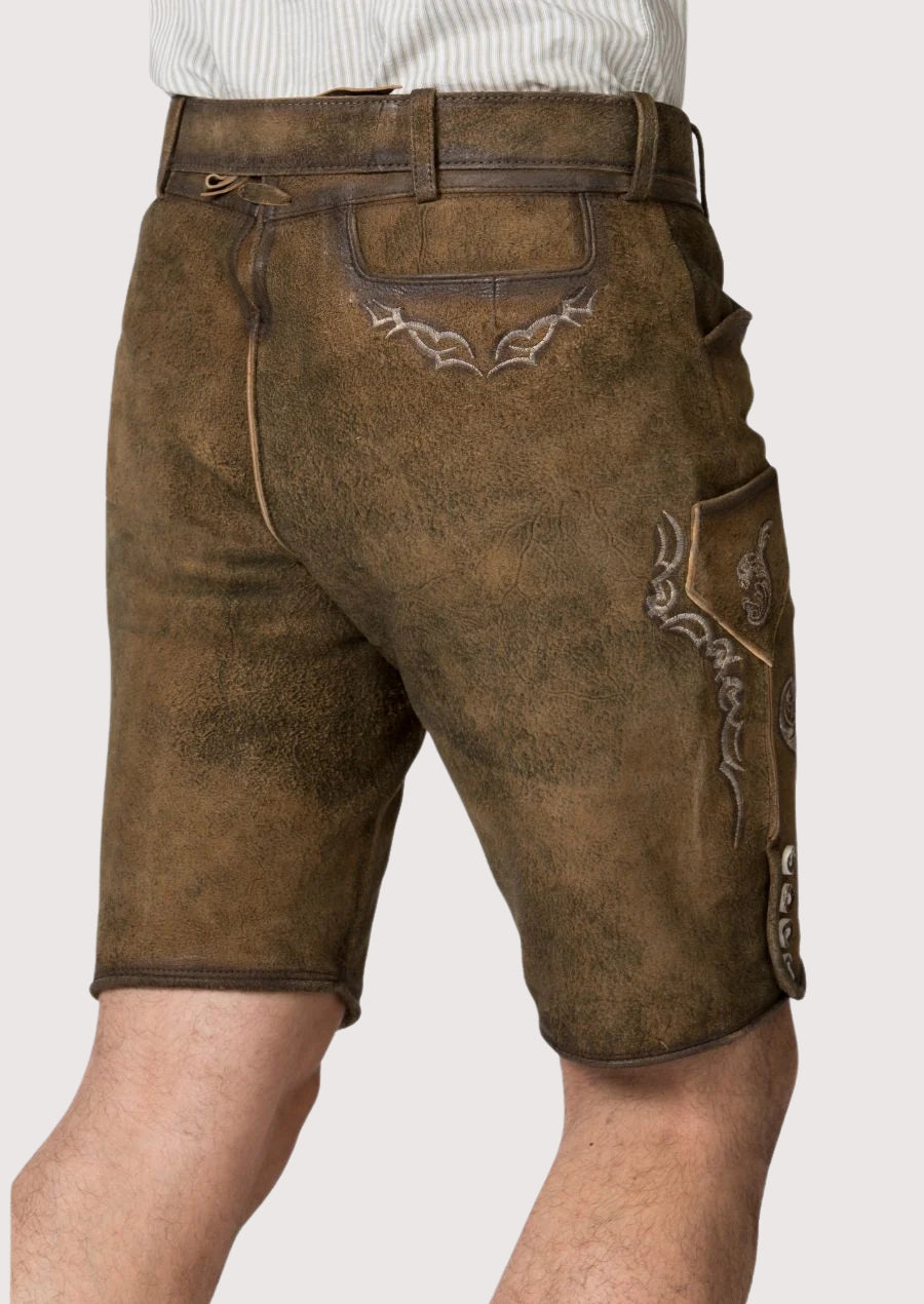 Premium men’s leather lederhosen in brown with traditional embroidery, knee-length cut, and heritage Bavarian style.