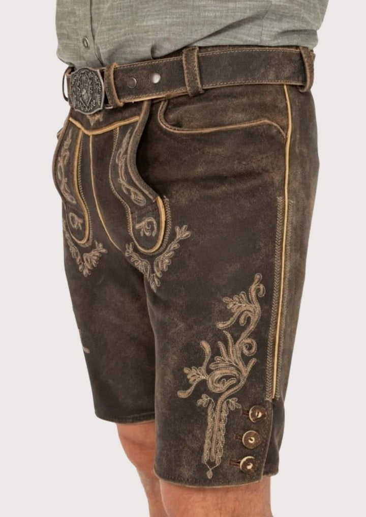 Stylish men's lederhosen with high-quality leather and detailed floral embroidery, perfect for cultural events.