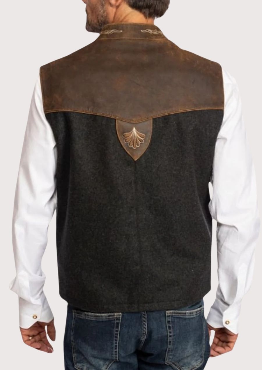 Stylish Rustic Bavarian Vest with leather shoulders and intricate embroidery, a timeless piece for cultural celebrations.