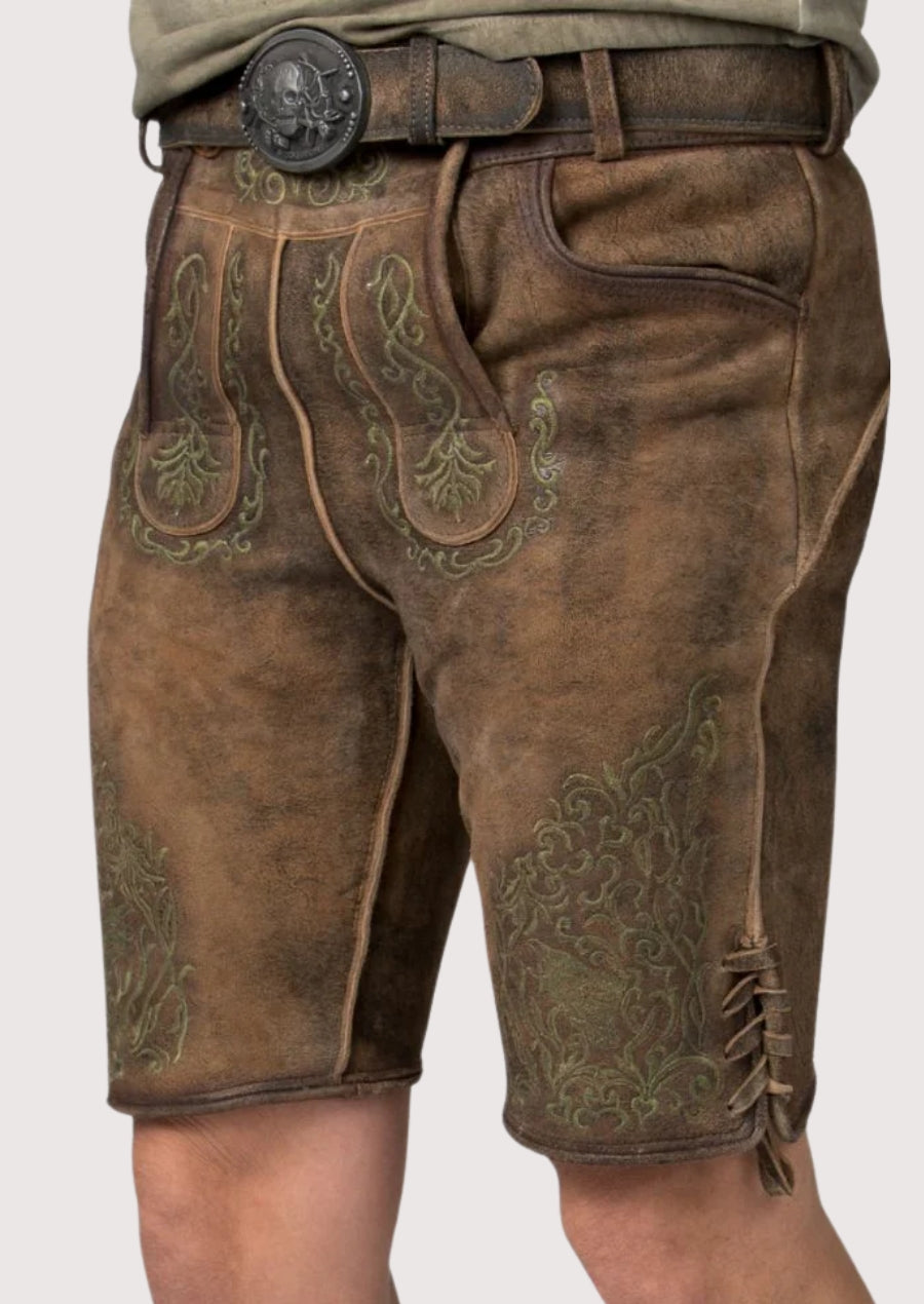 Rustic leather lederhosen shorts with green embroidered details for Oktoberfest styling