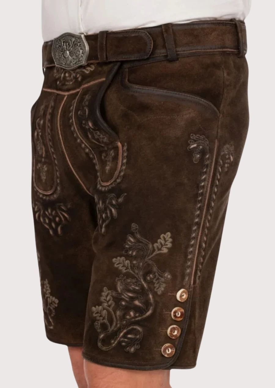 Authentic Bavarian Lederhosen for men with a deep brown color and traditional embroidery – ideal for festivals.