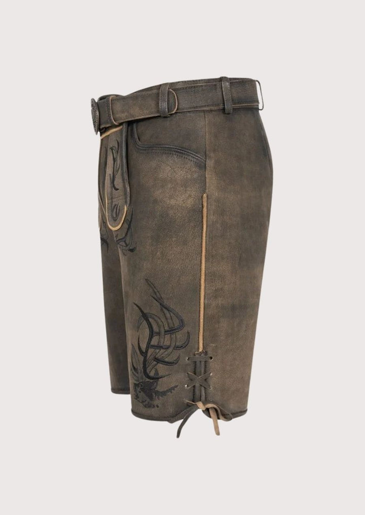 Traditional Bavarian lederhosen leather shorts with folk embroidery and vintage finish