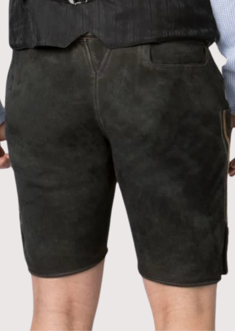 Premium black leather lederhosen shorts styled for Oktoberfest with decorative stitching